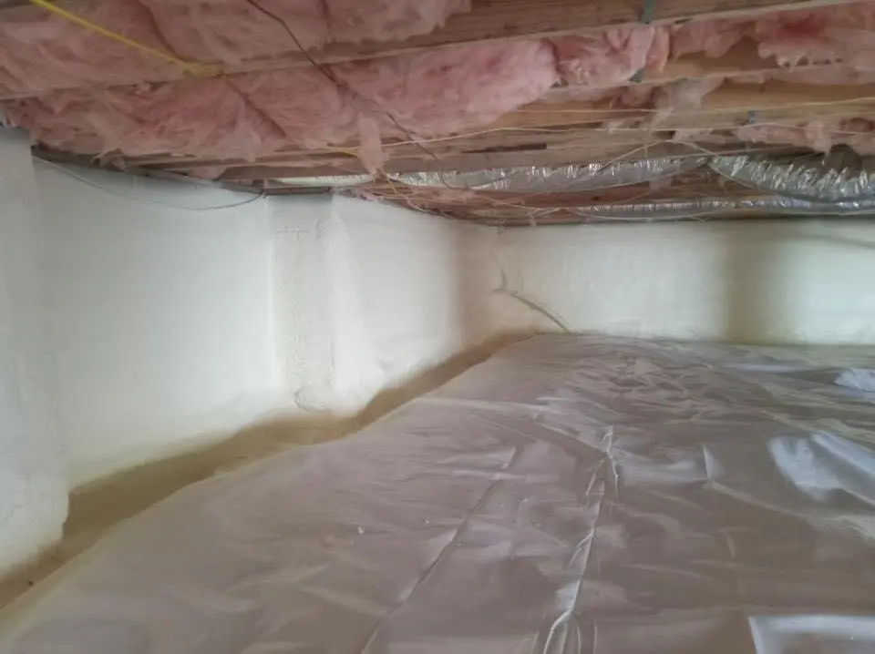 Crawl space encapsulation with closed-cell spray foam for Commercial Roof Restoration in Ladson